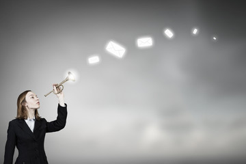 Woman speaking in horn