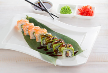 Japan cuisine. Sushi on a gete over wooden background