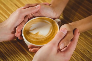  Coffee with a heart with happy couple