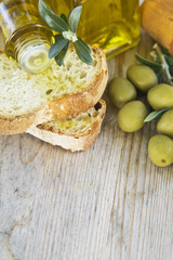 bread with olive oil and olives