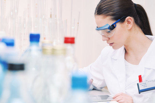 scientist in glasses working at the laboratory