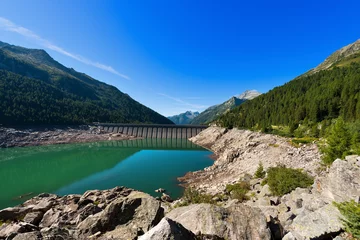 Photo sur Plexiglas Barrage Lac Bissina avec barrage - Adamello Trento Italie. Barrage de Bissina (1952-1962). Barrage droit en béton (563 m de long) dans le Parc National d& 39 Adamello Brenta. Trentin-Haut-Adige, Italie
