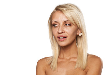 Fototapeta premium young woman without makeup posing in the studio