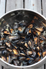 Steamed fresh mussels with wine and parsley.