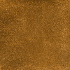 background of leather painted gold