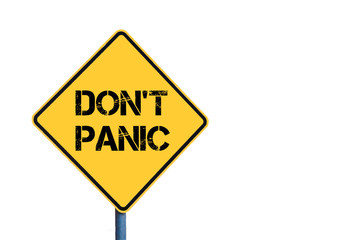Yellow roadsign with Don't Panic message