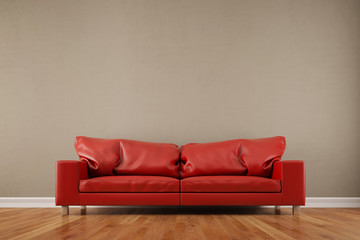 Rotes Sofa vor leerer Wand im Wohnzimmer