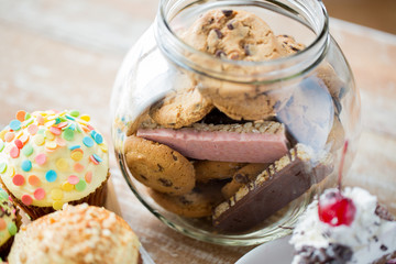 close up of cupcakes, cookies and muesli bars