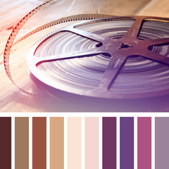  image of old 8 mm movie reel. vintage filter with palette color swatches

