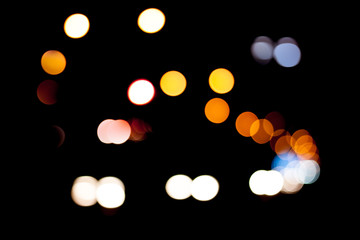 abstract dark bokeh lights background ,  defocused background, g