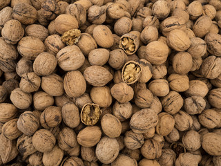 Pile of walnuts. Agriculture background.