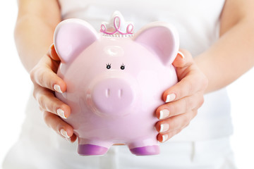 Woman holding pig money-box
