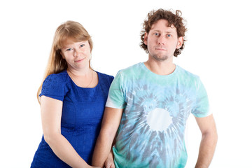 Fototapeta premium Smiling Caucasian young couple together, man and woman isolated on white background