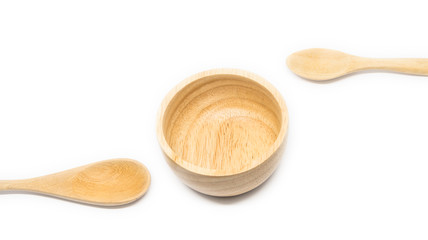 Empty wood spoon and bowl isolated