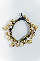 wrist bracelet of beads and precious stones Selective focus point