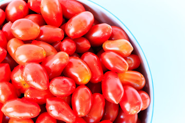 Group of cherry tomatoes isolated on white background