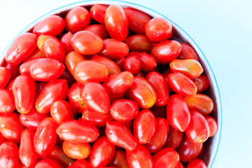 Group of cherry tomatoes isolated on white background