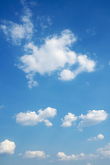 Obraz na płótnie Canvas Heaven. Blue sky and white clouds over horizon.