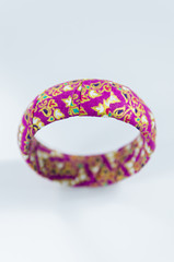 wrist bracelet of beads and precious stones Selective focus point
