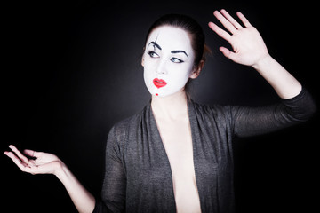 woman in mime make-up dancing