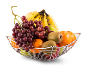 Composition with assorted fruits in  basket isolated on white