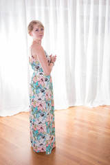 Portrait attractive young woman in summer dress