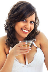Young bride drinking martini