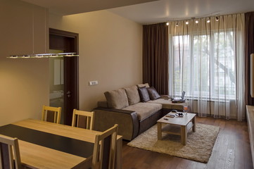 Living room with dining-table in renovated apartment in Sofia