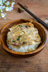 Salt and black pepper grilled pork with Japanese Rice in wooden