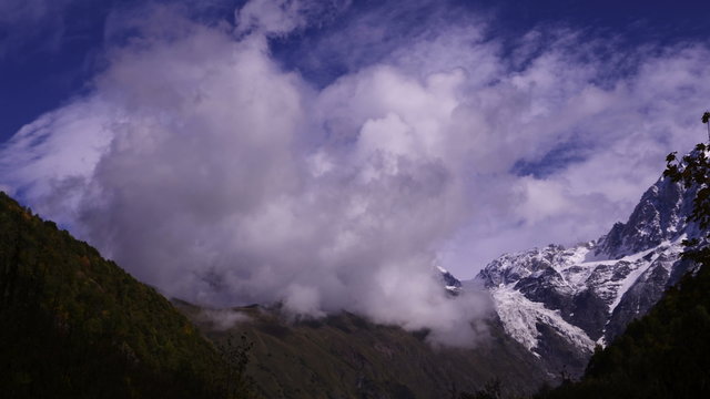 Time-lapse. Clouds in the Caucasus Mountains. 4K