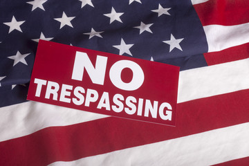Fototapeta na wymiar US flag NO Trespassing Sign