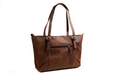 Naklejka premium brown leather bags with antique and retro looks made from goat's skin for travel,students,executives,ladies handbags - isolated on white shot in different layouts straight, back, open and lay flat 