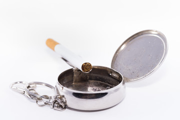 Cenicero de bolsillo.