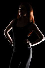 Fototapeta na wymiar Beautiful young woman with a red hair
