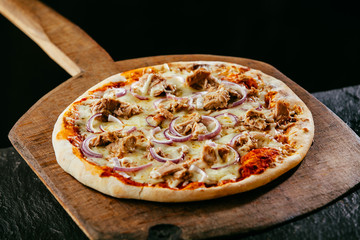 Freshly baked tasty traditional Italian pizza