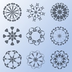 Nine snowflakes pattern on blue background