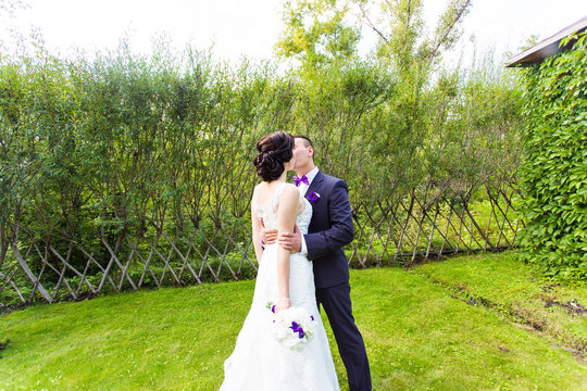 Bride and Groom at wedding Day walking Outdoors on autumn nature