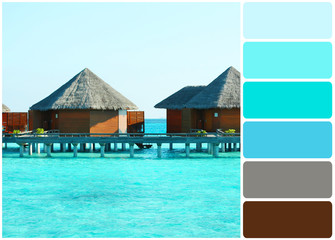 Water villas over ocean background, in resort and palette of colors