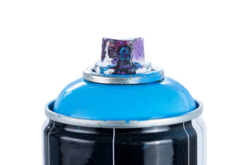 Close-up of a blue spray paint can with used and painty nozzle, isolated on white background.