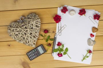 The writer writes a romance novel. A love letter for Valentine's Day. Declaration of love written on paper. Love in words and letters. Heart written declaration of love.
