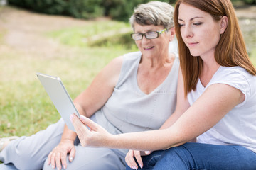 Elderly female and her grandchild
