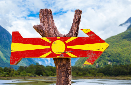 Macedonia Flag wooden sign with mountains background