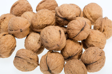 walnuts heap isolated on  white background