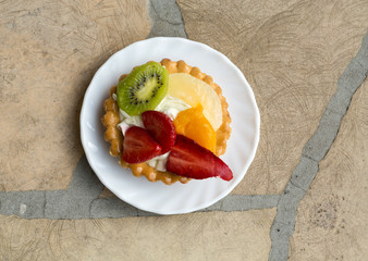 Close up of sweet cake with fruits