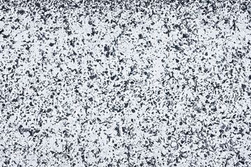 Grunge cracked white paint asphalt texture.