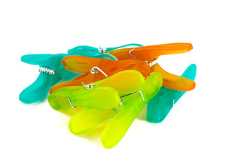 colorful clothespins isolated on white