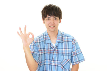 Fototapeta premium パジャマ姿の笑顔の男性