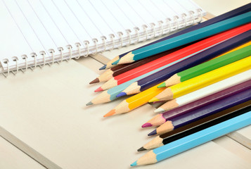Colorful pencil with notepad