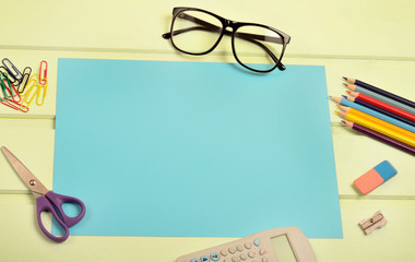 Blue paper with office supply