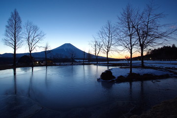 Mountain Fuji during sunrise with small lake at Fumoto para camping ground